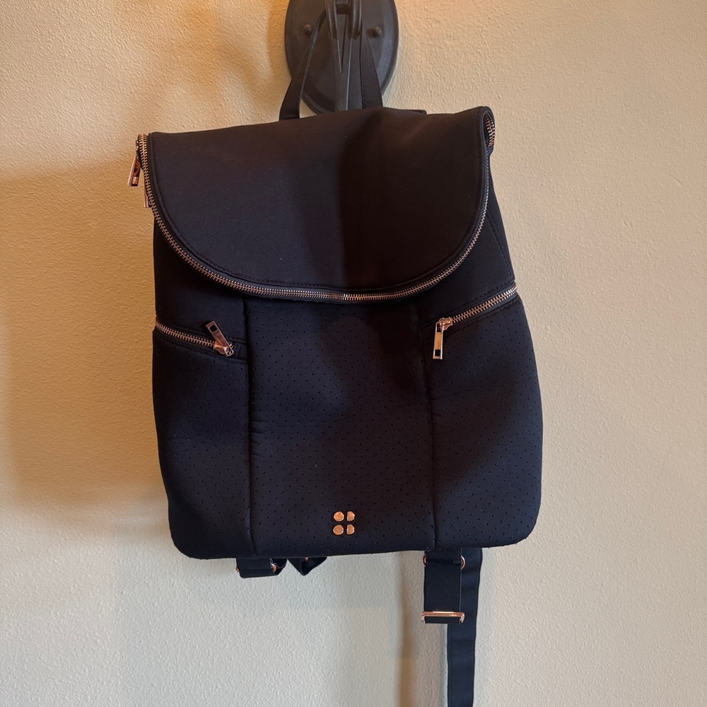Sweaty Betty All Sport Backpack. Black with rose gold hardware.